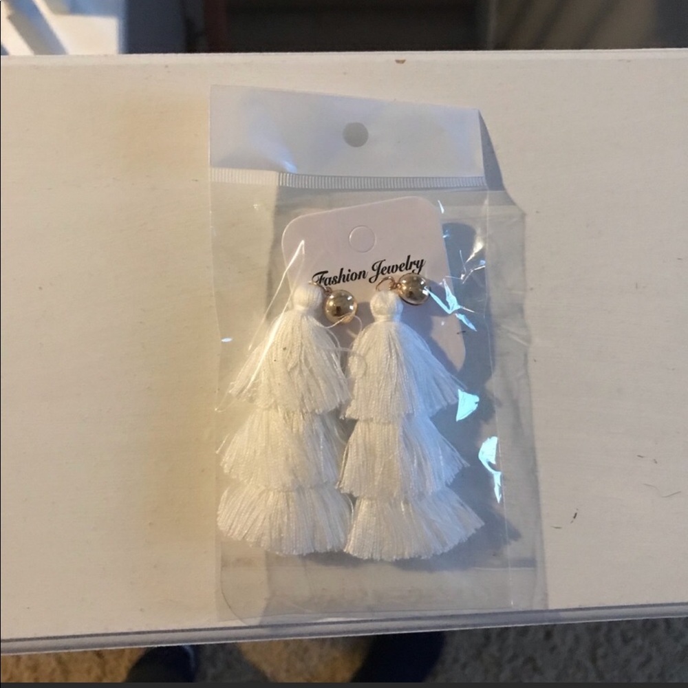 White tassel earrings